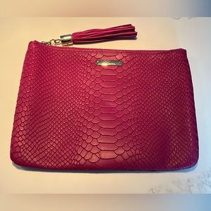 NWOT Gigi embossed python leather all in one bag.  Mulberry color.